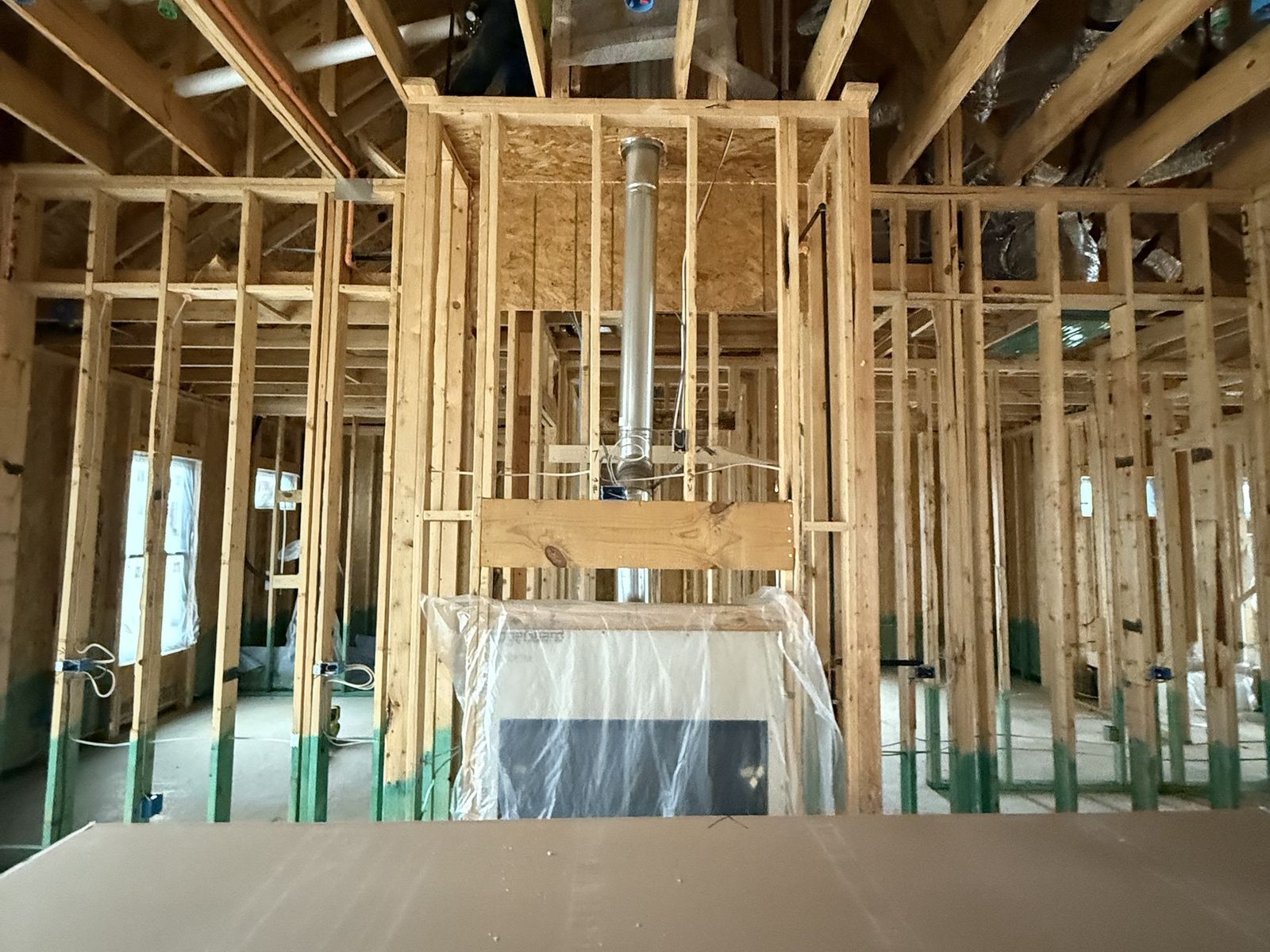 Framing, wiring and gas fireplace before drywall